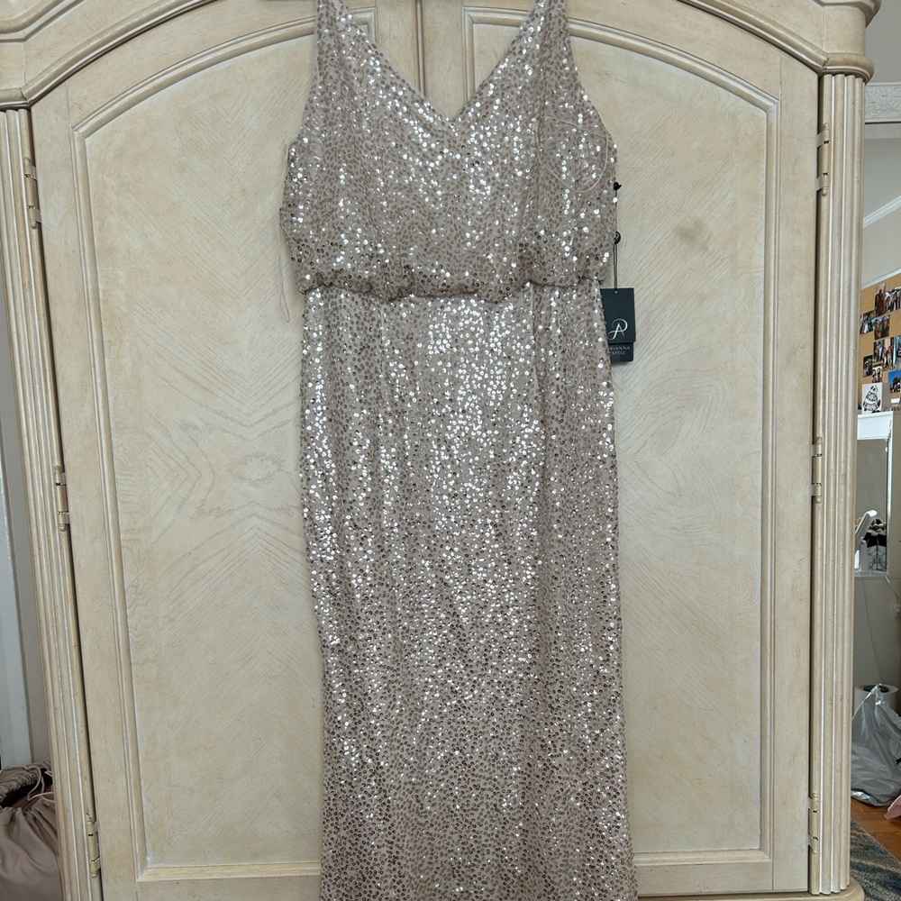 Beautiful Adrianna Papell gold evening gown. Never worn with tag. Make me offers